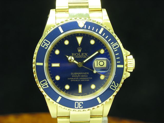 Rolex Submariner Date 18kt Gold Herrenuhr / Fullset 1991 / Purple Dial / Ref 16618