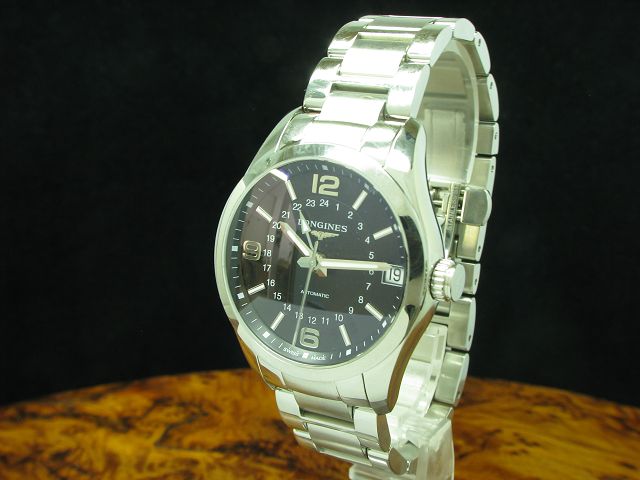 Longines Conquest Classic GMT Edelstahl Automatic Herrenuhr / Ref L2.799.4.56.6 / Kaliber L704.2